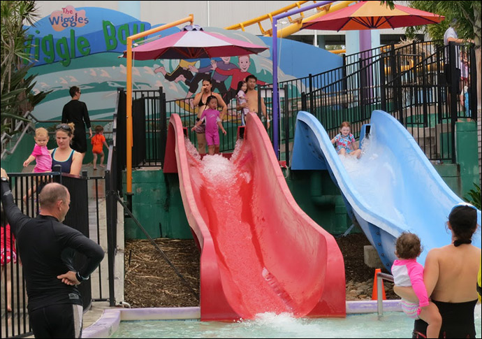 Little Kids Water Slides in front of the Wiggle bay Mural