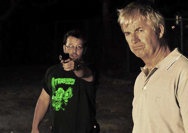 Anthony Marriott and John Jarratt onset of Bad Behaviour Shoot featuring the latest Trasharama agogo T-shirt.